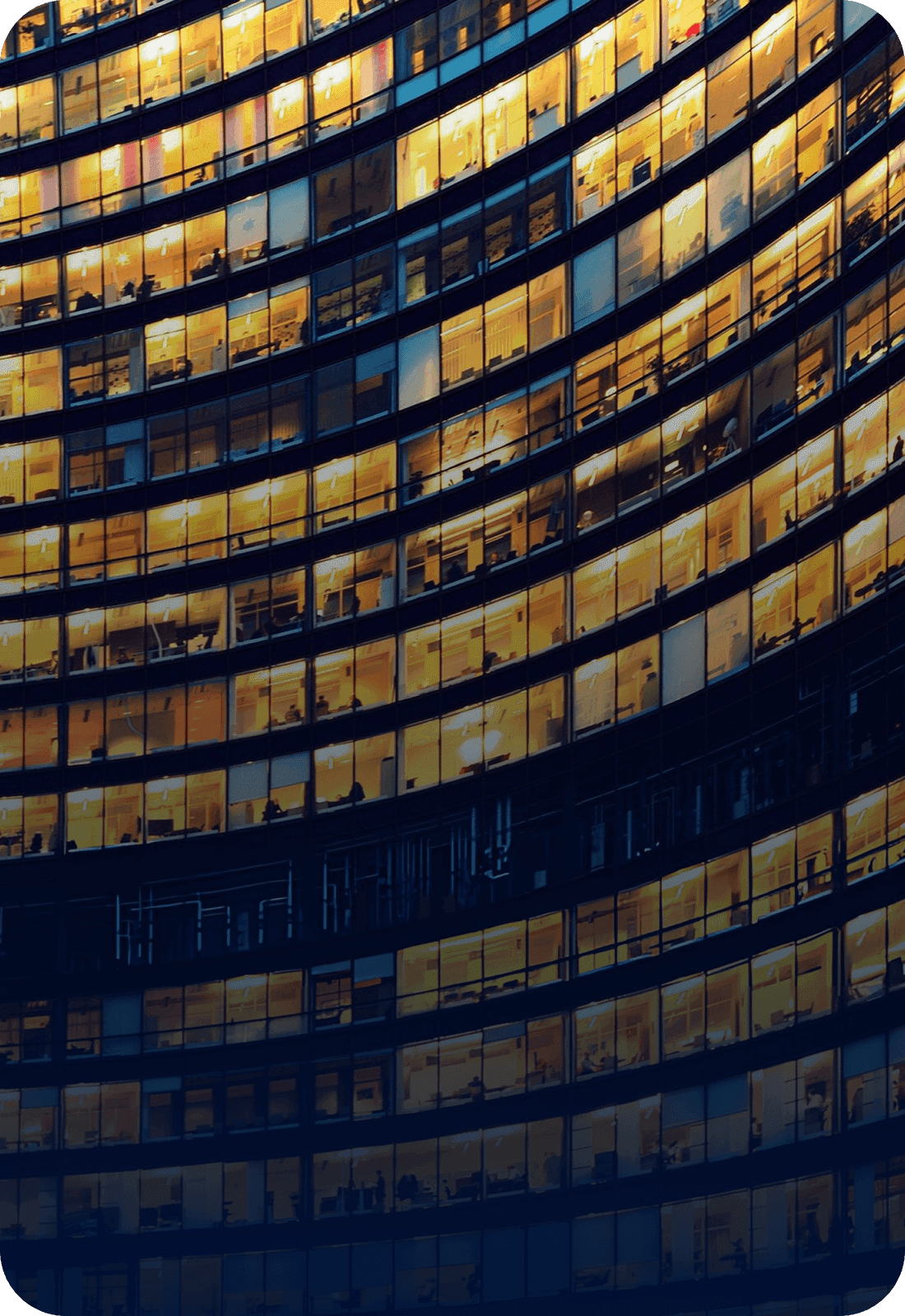Illuminated office tower at night